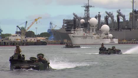 Amphibious-Armored-Assault-Vehicles-Are-Driven-Across-A-Bay-And-Onto-A-Ship-2