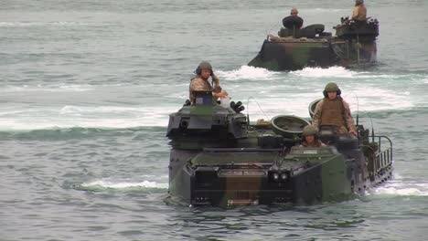Amphibious-Armored-Assault-Vehicles-Are-Driven-Across-A-Bay-And-Onto-A-Ship-3