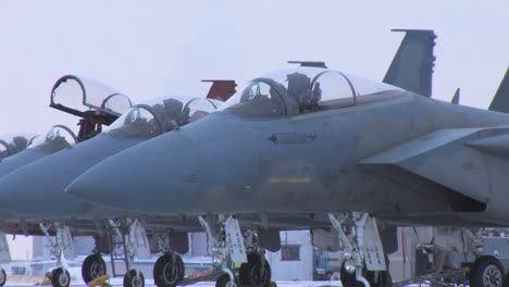 F15-Jet-Fighters-Prepare-For-A-Mission-On-A-Snowy-Morning-In-Montana-1