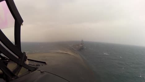 Pov-Shot-From-Jet-Fighter-Plane-Landing-On-An-Aircraft-Carrier