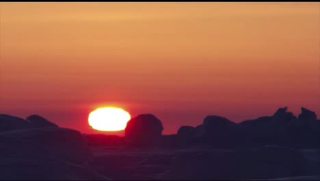 A-Time-Lapse-Of-The-Midnight-Sun-Across-The-Horizon-And-Frozen-Temperatures-Of-The-Arctic