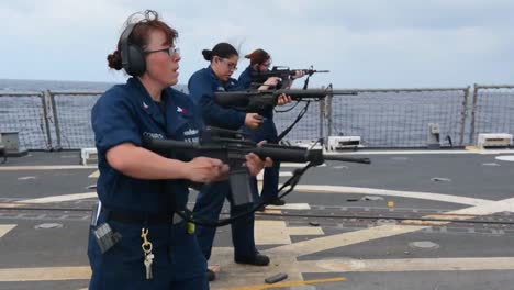 Navy-Women-Conduct-Live-Fire-Exercise-On-The-Deck-Of-A-Warship