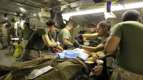 A-Wounded-Soldier-Undergoes-Emergency-Surgery-In-A-Field-Hospital-In-Afghanistan