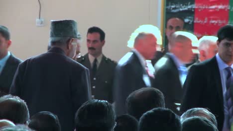 Afghan-Government-And-Military-Officials-Gather-In-A-Large-Hall-For-A-Speech