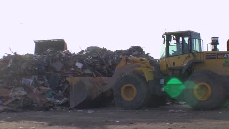 Huge-Piles-Of-Garbage-And-Rubble-Are-Bulldozed-In-A-Junkyard-Following-Hurricane-Sandy-1
