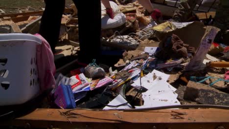Residents-Pick-Through-The-Ruins-Of-Their-Homes-After-The-Devastating-2013-Tornado-In-Moore-Oklahoma-5