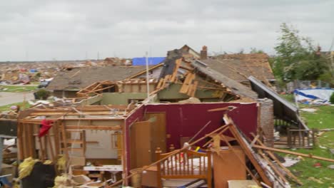 Residents-Pick-Through-The-Ruins-Of-Their-Homes-After-The-Devastating-2013-Tornado-In-Moore-Oklahoma-9