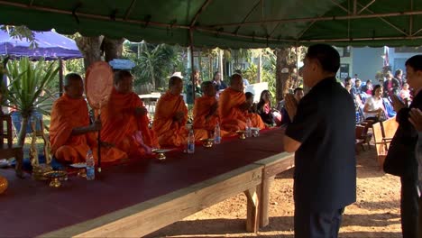Buddhist-Monks-Pray-In-A-Temple-In-Thailand