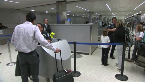 Passengers-Coming-Into-An-International-Airport-Terminal-Pass-Through-Us-Customs
