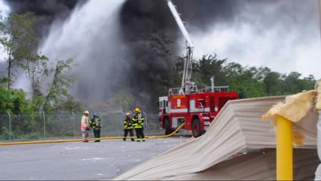 Raw-News-Footage-As-Firefighters-Battle-A-Fire-And-Explosion-After-A-Train-Derailment