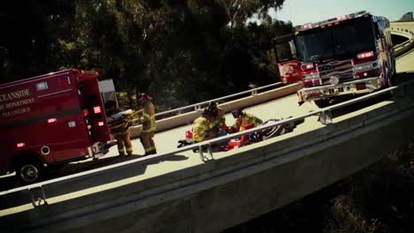 A-Motorcycle-Rider-Has-A-Bad-Accident-On-The-Freeway-And-Is-Attended-By-The-Fire-Department