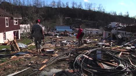 National-Guard-Soldiers-Patrol-A-Neighborhood-In-West-Liberty-Kentucky-Following-A-Devastating-Tornado