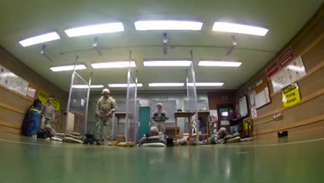 Army-Soldiers-Practice-At-An-Indoor-Target-Range
