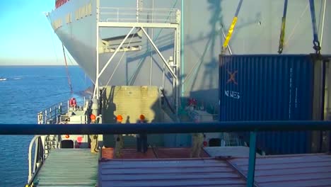 Time-Lapse-Of-A-Cargo-Ship-At-Sea-And-Docking-And-Unloading