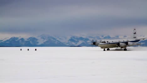 A-Prop-Airplane-Takes-Off-From-The-Frozen-Tundra-In-An-Arctic-Region
