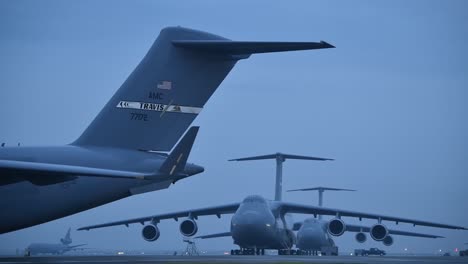 Good-Establishing-Shot-Of-Travis-Air-Force-Base-With-Large-Aircraft-On-Runway-At-Dawn