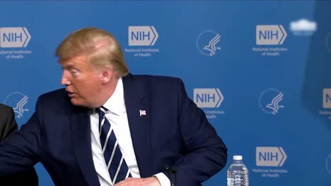 2020-At-A-Coronavirus-Covid19-Meeting-With-Memebers-Of-The-Nih-President-Donald-Trump-Shakes-Hands-With-Doctors-And-Administrators