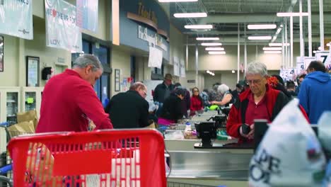Shoppers-Crowd-And-Hoard-Food-At-A-Supermarket-During-The-Early-Days-Of-The-Covid19-Coronavirus-Epidemic-Outbreak