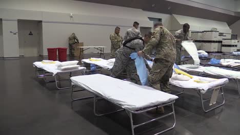 National-Guardsmen-Set-Up-Beds-And-Cots-At-The-Santa-Clara-Convention-Center-In-California-An-Emergency-Hospital-During-The-Coronavirus-Covid19-Outbreak-Epidemic-5