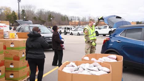 Us-Army-Soldiers-Distribute-Food-At-A-West-Michigan-Food-Bank-During-The-Covid19-Corona-Virus-Outbreak-Emergency-Pandemic-Outbreak-Food-Shortage