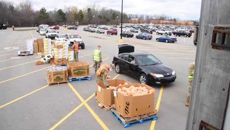 Us-Army-Soldiers-Distribute-Food-At-A-West-Michigan-Food-Bank-During-The-Covid19-Corona-Virus-Outbreak-Emergency-Pandemic-Outbreak-Food-Shortage-1