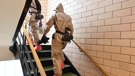 Members-Of-The-National-Guard-Sanitize-An-Office-Workspace-During-The-Coronavirus-Covid19-Outbreak-Pandemic