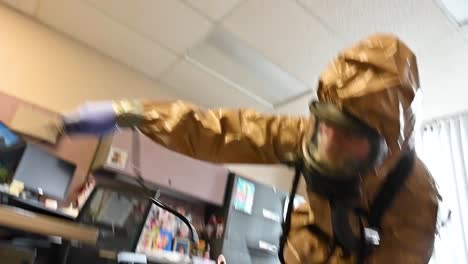 Members-Of-The-National-Guard-Sanitize-An-Office-Workspace-During-The-Coronavirus-Covid19-Outbreak-Pandemic-6
