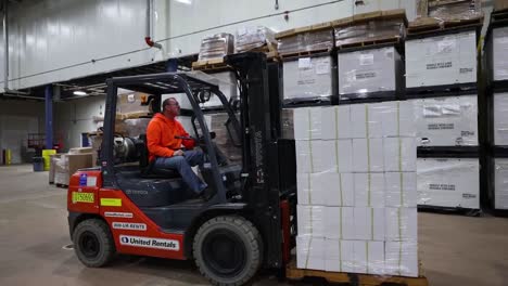 Rhode-Island-National-Guard-And-Fema-Workers-Track-Covid19-Coronavirus-Equipment-Inventory-And-Ship-Supplies-In-Warehouse-With-Forklift
