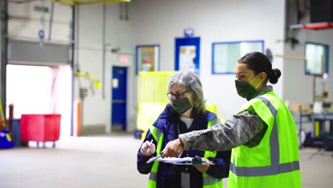 Rhode-Island-National-Guard-And-Fema-Workers-Track-Covid19-Coronavirus-Equipment-Inventory-And-Ship-Supplies-In-Warehouse-With-Forklift-1