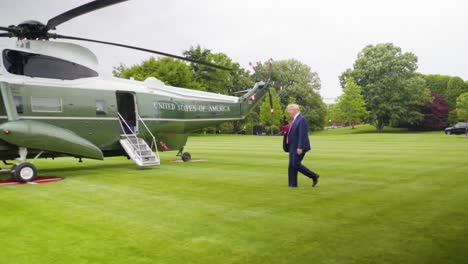 Us-President-Donald-Trump-Walks-Across-White-House-Lawn-And-Boards-Marine-One-Helicopter