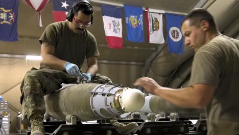 Us-Air-Force-Airmen-Of-332-Aew-Ammo-Shop-Assemble-Weapons-And-Munitions-For-A-Bombing-Mission-8