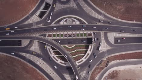 Aerial-Straight-Down-Of-Traffic-Circle-Or-Roundabout-With-Car-Traffic-Amman-Jordan-6
