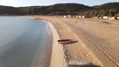 Boat-On-Empty-Beach-Due-To-Coronavirus