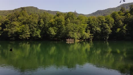 Lake-Reflecting-A-Green-Landscape-1