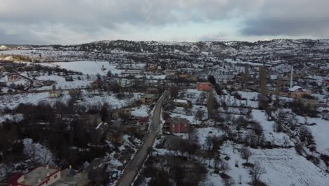 Snowy-Village-Landscape-Drone-View