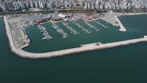 Drone-Image-Moving-Towards-The-City-Over-The-Marina