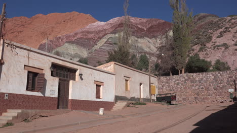 Argentina-Purmamarca-hill-of-seven-colors-beyond-houses