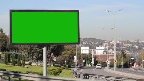 Advertising-Billboard-Green-Screen-On-Sidelines-Of-Expressway-With-Traffic-1
