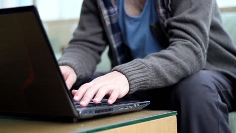 Close-Up-Shot-Of-Man'S-Hands-Working-A-Laptop-Keyboard-And-Mouse