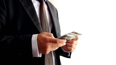 Businessman-Making-Online-Payment-With-Credit-Card-And-Smartphone-1