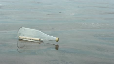 Message-In-A-Bottle-On-Sea-Wave