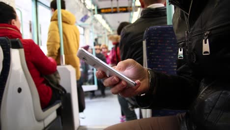 Using-Smartphone-Inside-Of-Subway