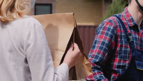 The-Messenger-Delivers-Packages-Of-Products-To-The-Doorstep-Of-The-Customer's-House