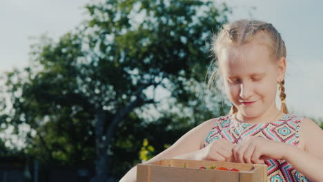 Funny-Girl-Eats-Strawberries-On-A-Summer-Day-1