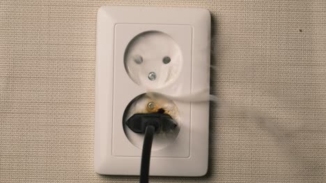 A-flame-appears-in-a-plug-outlet