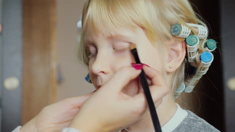 Portrait-Of-5-Years-Old-Girl-Doing-Makeup