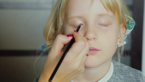 Portrait-Of-5-Years-Old-Girl-Doing-Makeup-1