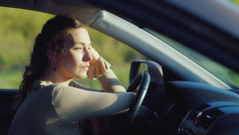 Portrait-Of-Caucasian-Woman-Crying-In-Car-1