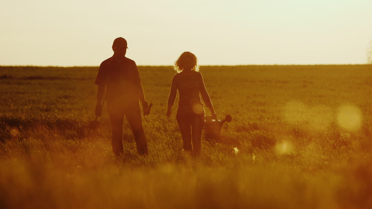 Premium stock video - Steadicam shot: farmers - a man and a woman ...