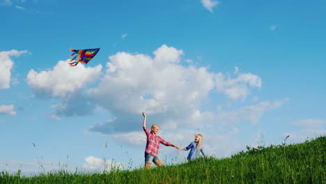 Mom-And-Daughter-Are-Playing-With-A-Kite